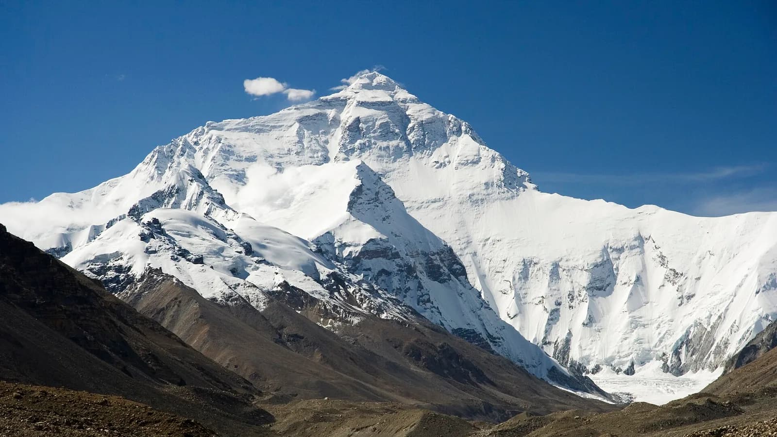 Mount Everest beyond a high-altitude Tibetan valley