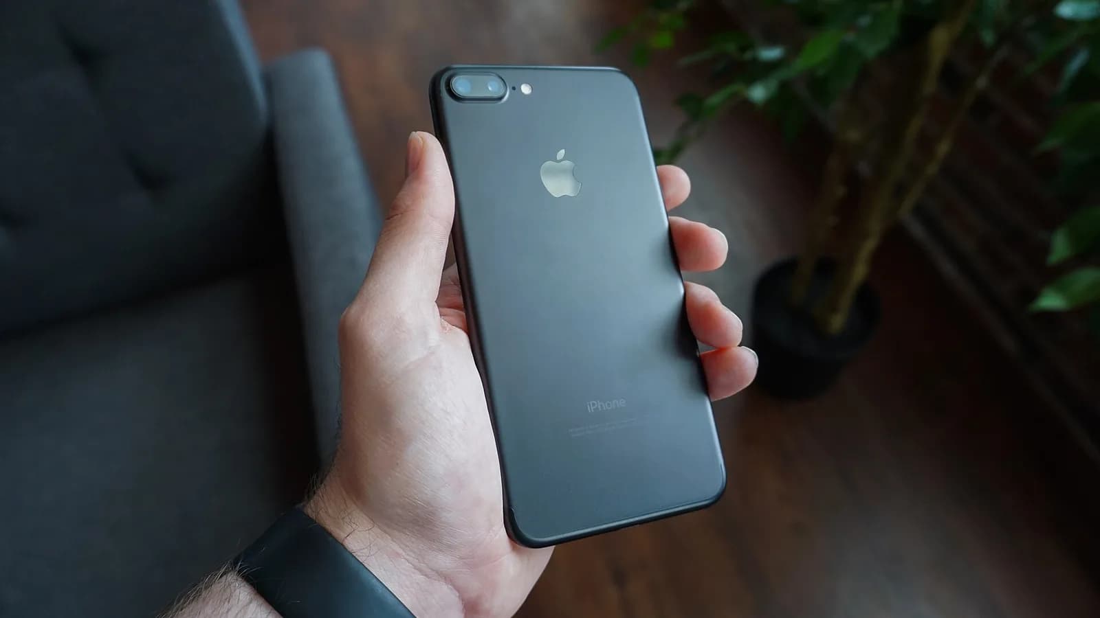 An international traveler preparing a smartphone before a trip to China