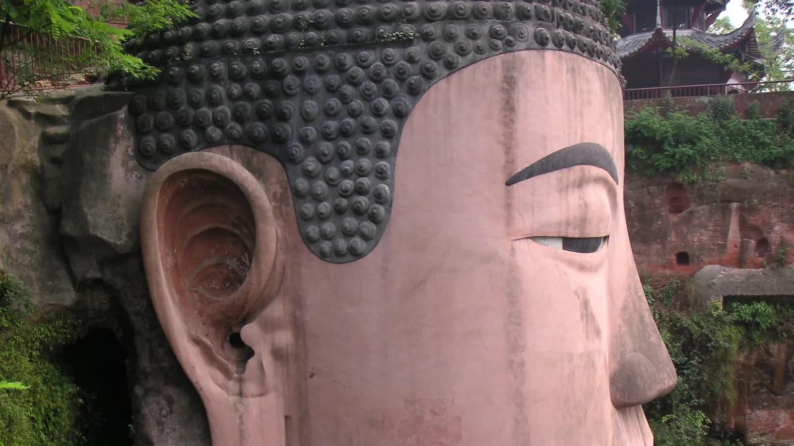 The Leshan Giant Buddha carved into a riverside cliff in Sichuan