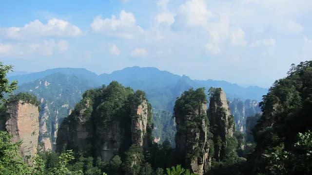 Sandstone pillars rising above the forest in Zhangjiajie National Forest Park