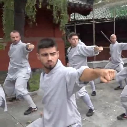 Travelers practicing foundational Shaolin movements