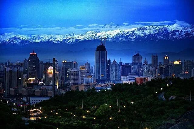 Ürümqi at dusk beneath the Tianshan mountains